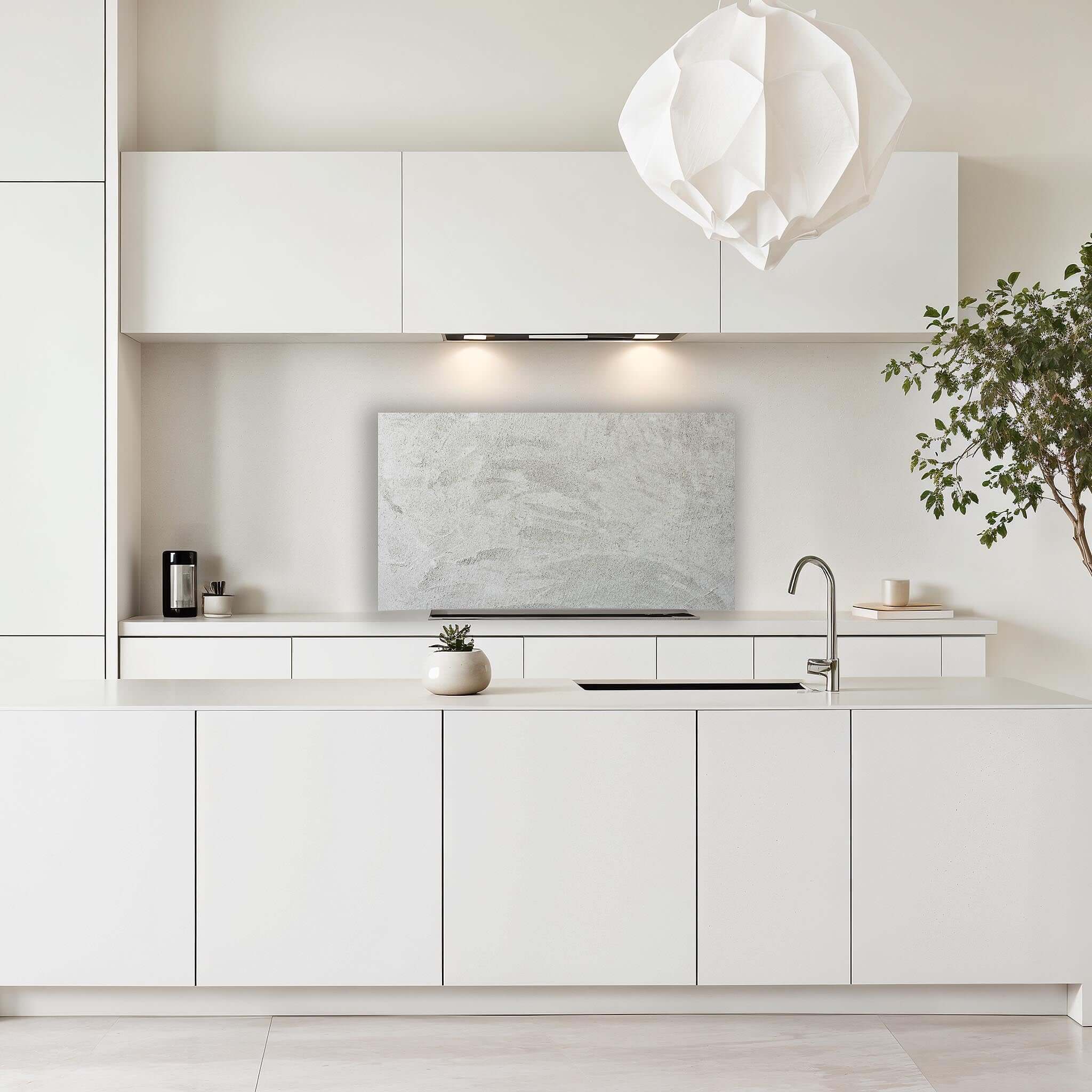 Modern keuken met een soft concrete finish spatscherm voor een stijlvolle en serene uitstraling.