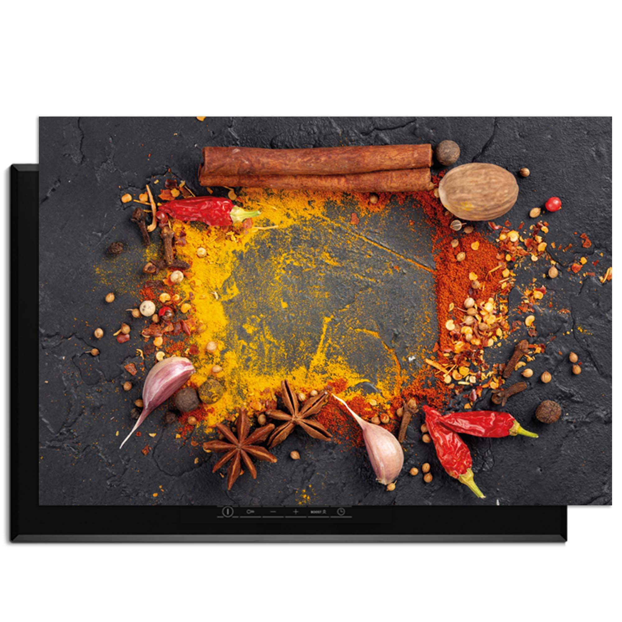 Eastern Spice Mix – Inductie Beschermer met kleurrijke specerijen en ingrediënten op een kookplaat.