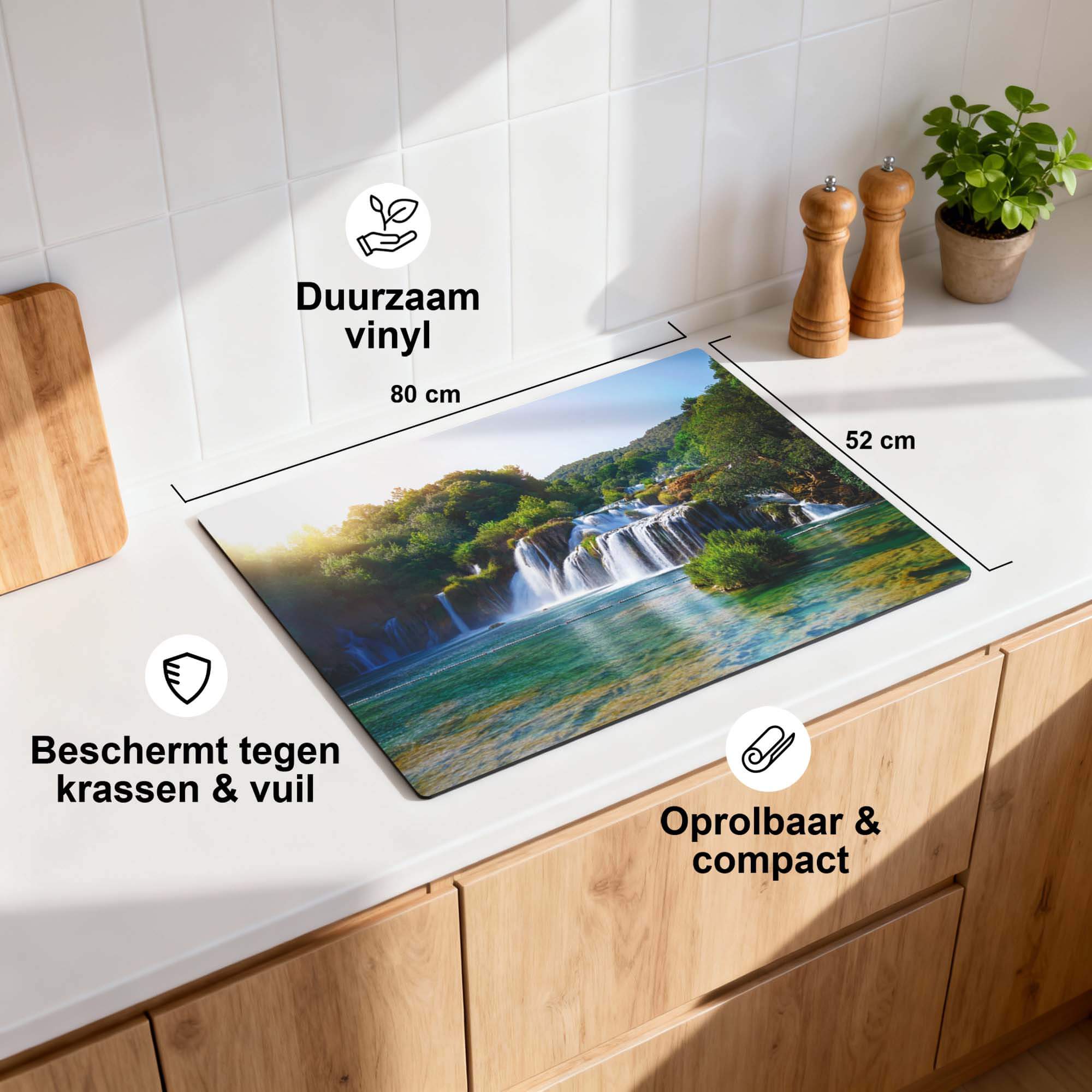 Whispering Falls – Inductie Beschermer op een keukenblad met een serene waterval en groene oase.