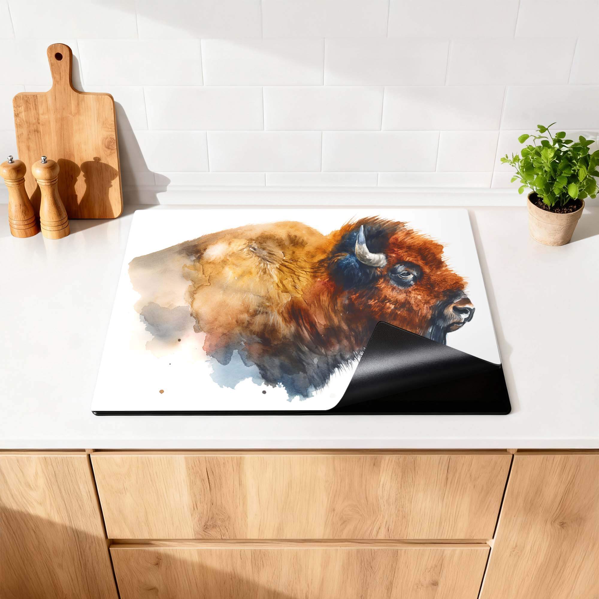 Majestic Bison - Inductie Beschermer op een keukenblad, elegant met een wilde bison afbeelding.