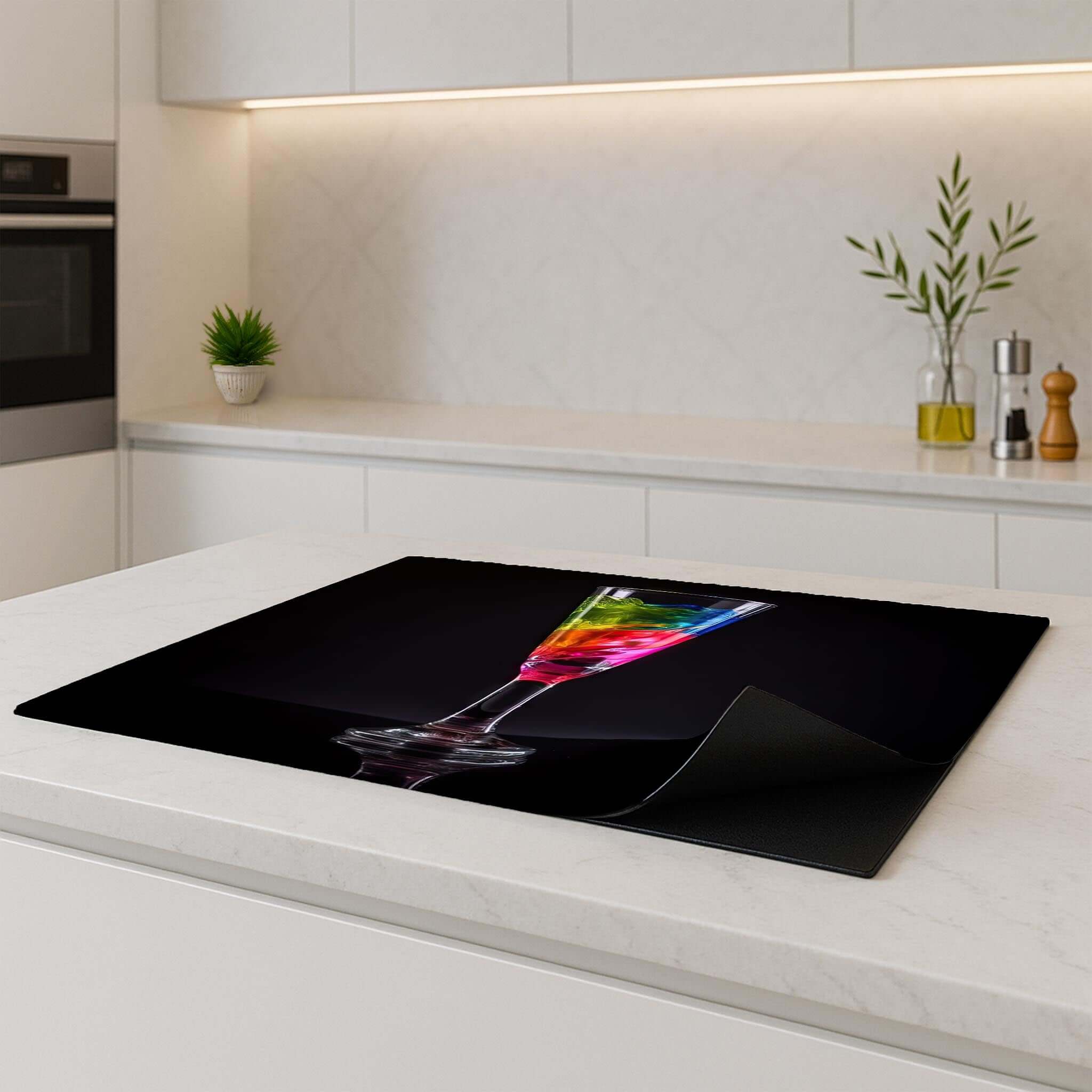 Colorful liquid art on an elegant induction protector in a modern kitchen.