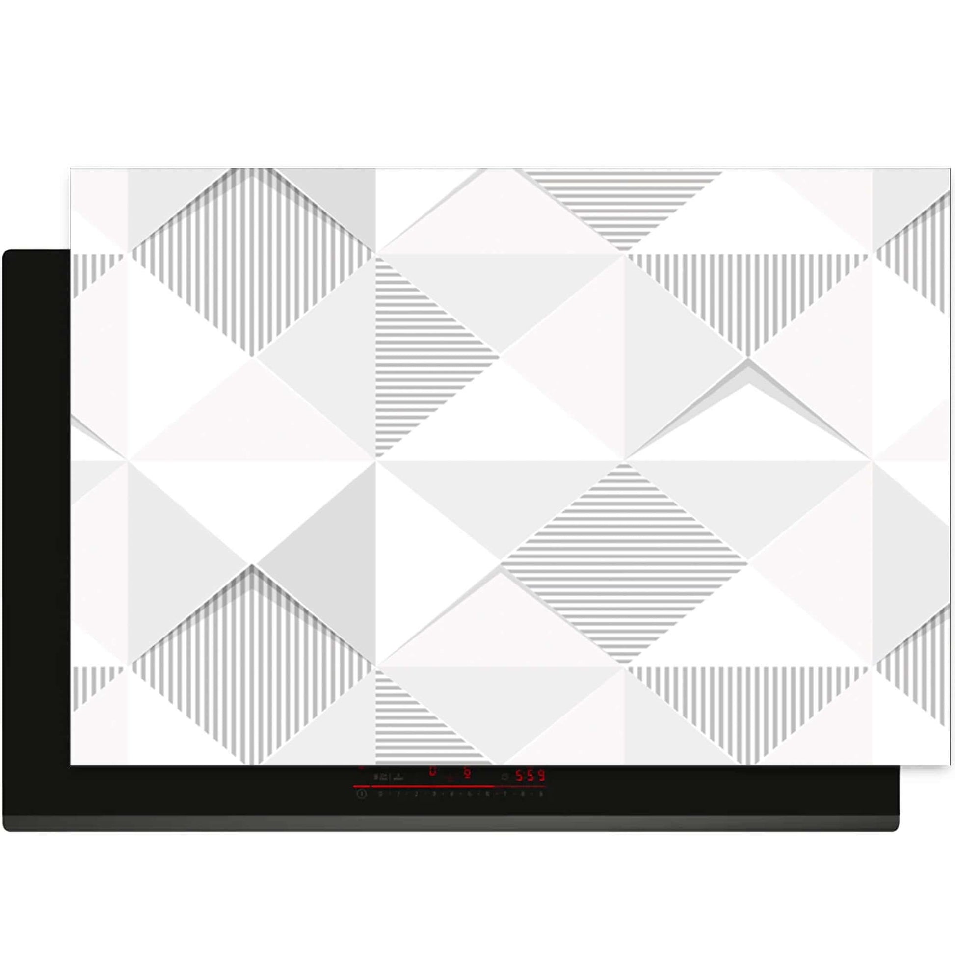 Bovenaanzicht van de Arctic Prism inductie beschermer met geometrisch design in grijstinten