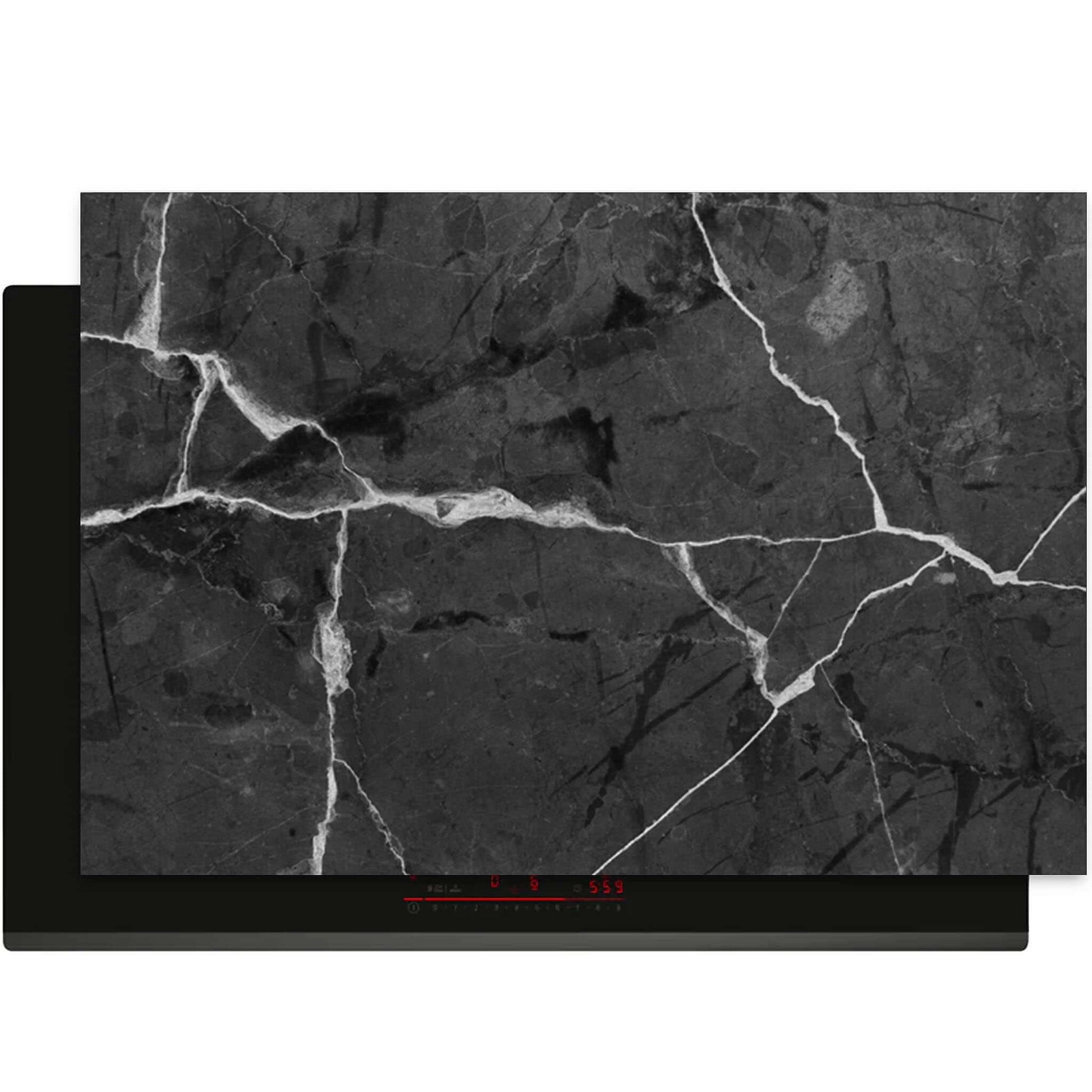 Bovenaanzicht van de Black Marble inductie beschermer met een stijlvol donker marmerpatroon