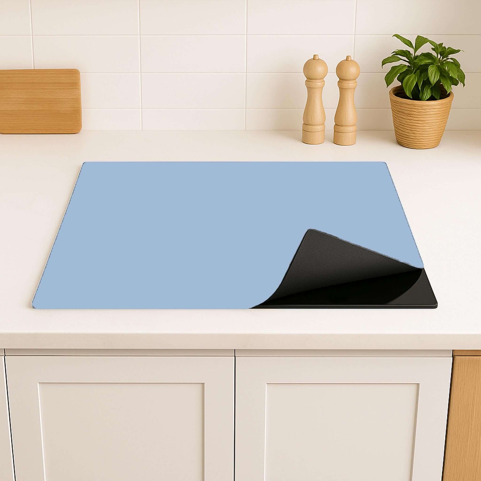 Zijaangezicht van de Clear Sky inductiebeschermer met antislip-laag zichtbaar