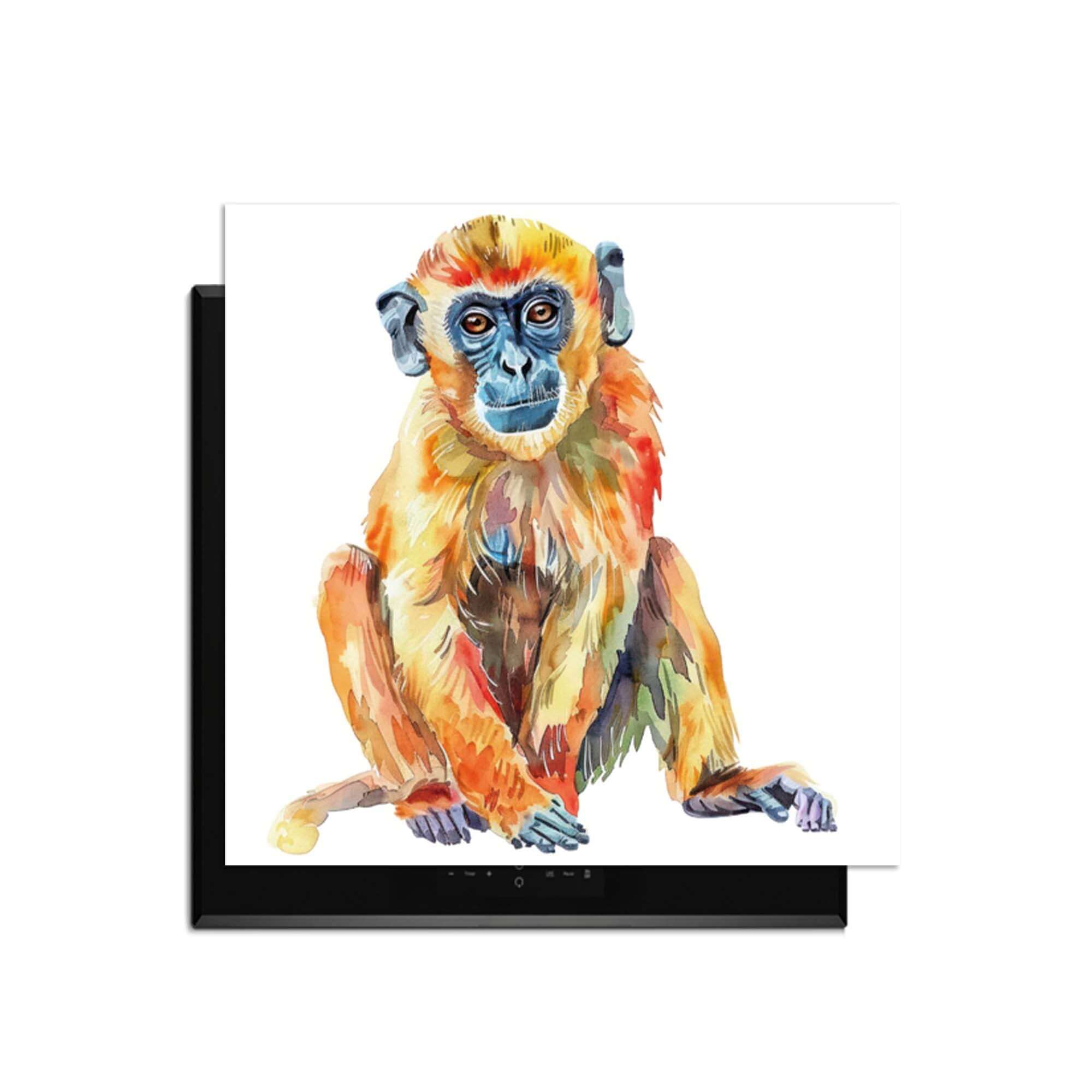 Colorful Monkey – Inductie Beschermer met een kleurrijke aap op een inductiekookplaat, perfect voor moderne keukens.