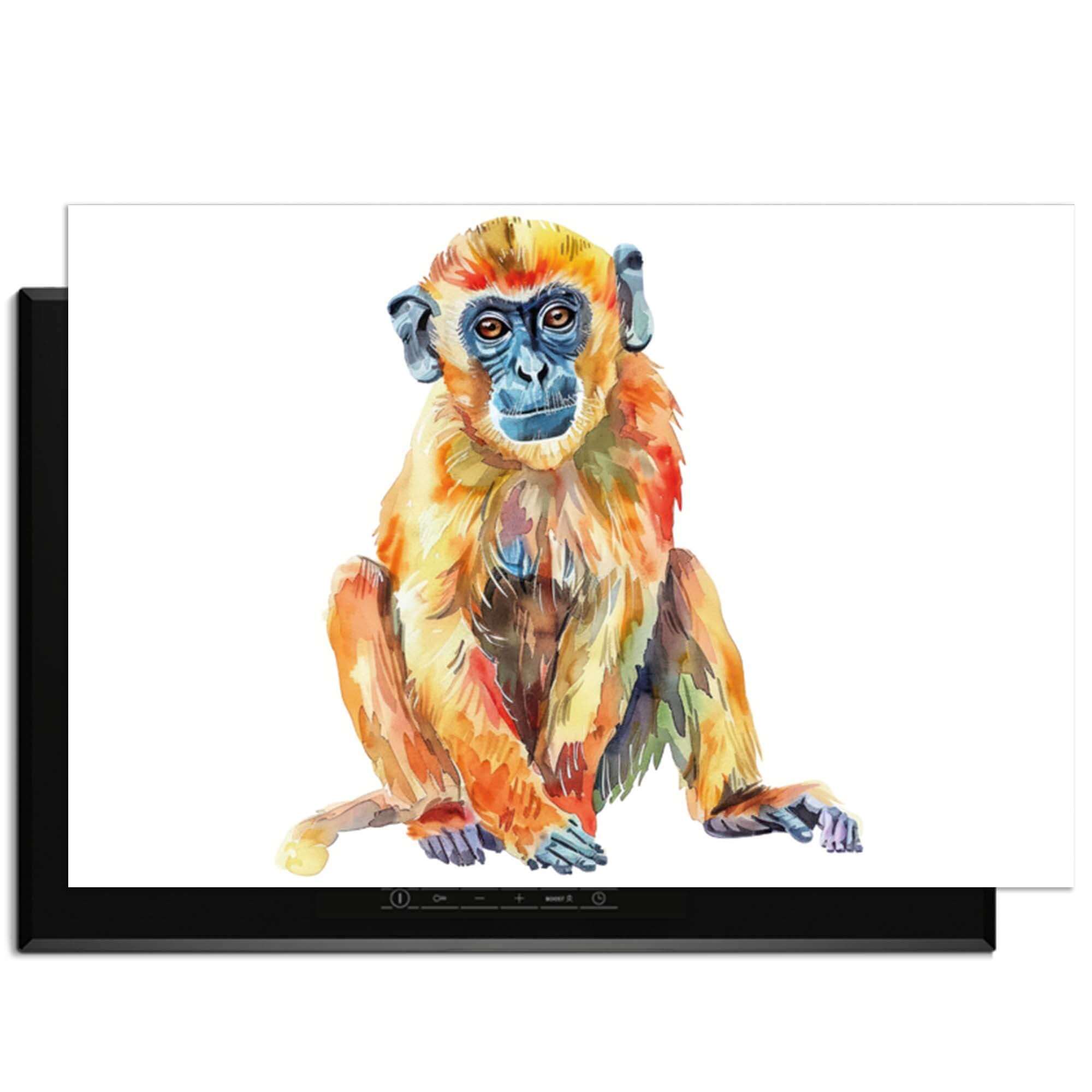 Colorful Monkey – Inductie Beschermer met kleurrijke aap op een inductiekookplaat, perfect voor moderne keukens.
