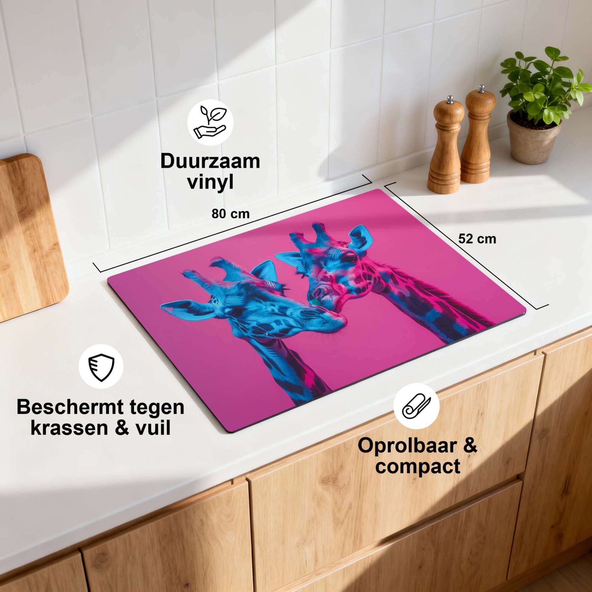 Neon Romance – Inductie Beschermer met kleurrijke giraffen op een keukenwerkblad.