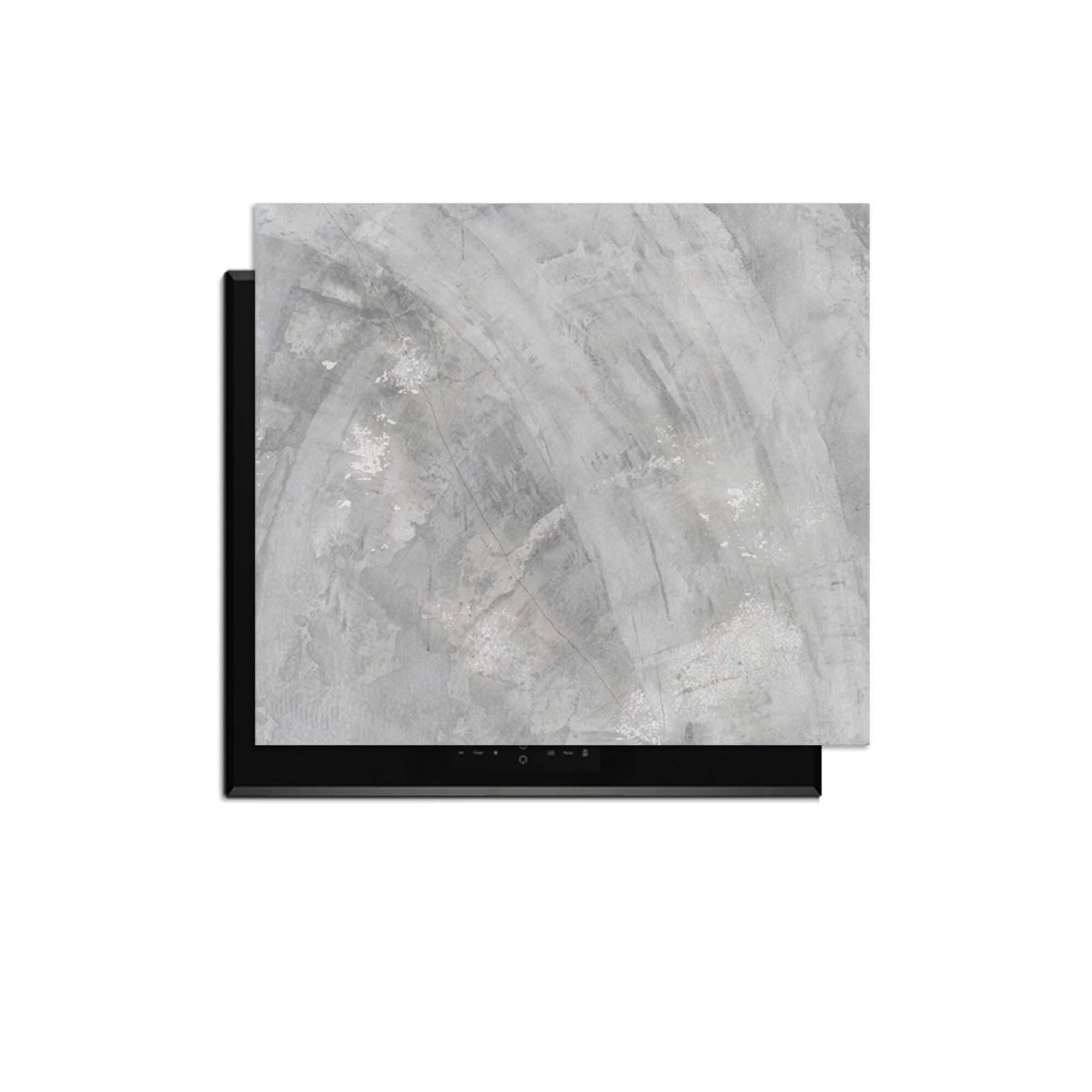 Concrete Flow - Induktionsschutz auf Induktionskochfeld mit grauem, modernem Look.