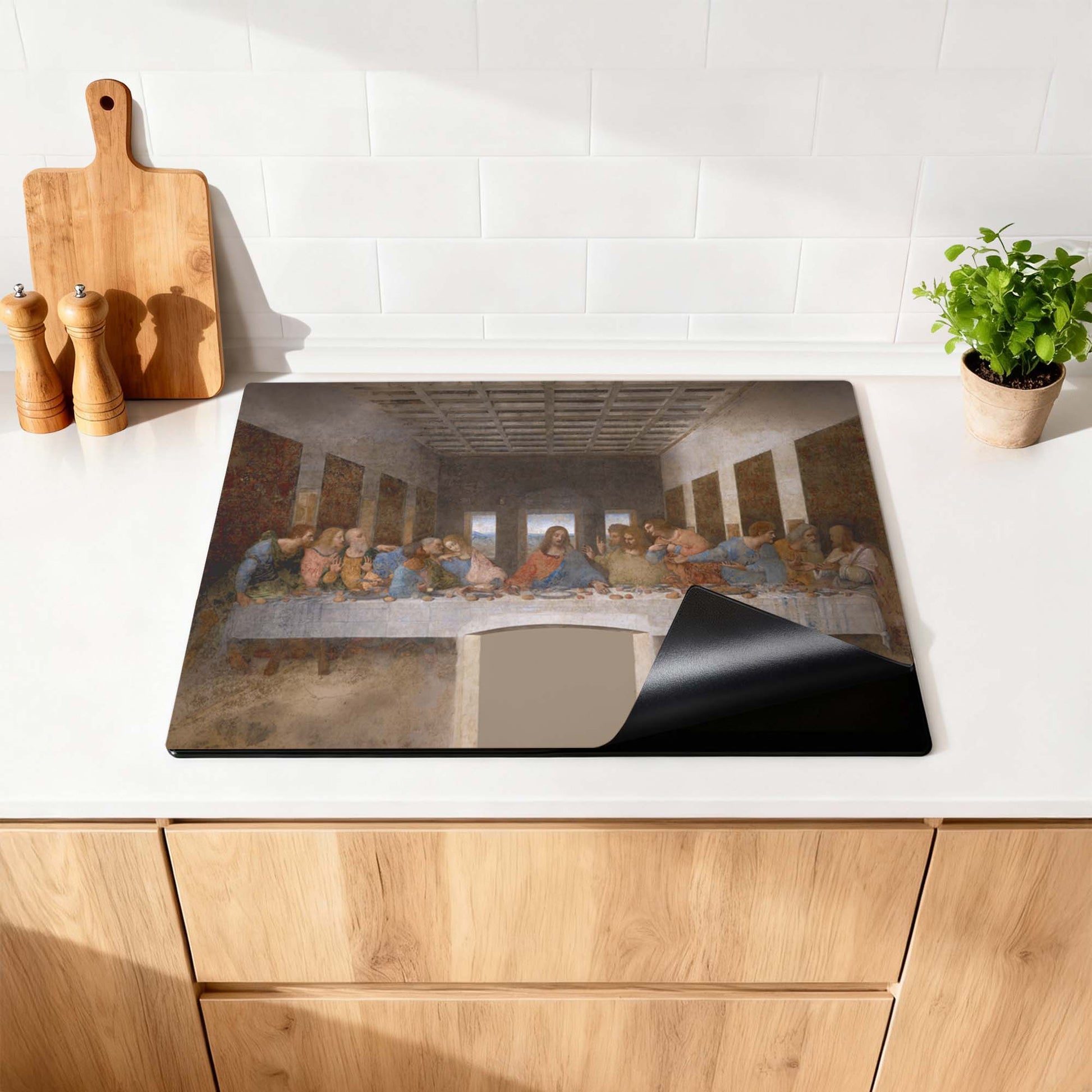 Laatste avondmaal – Inductie Beschermer in keuken met klassiek meesterwerk design voor indrukwekkende uitstraling.