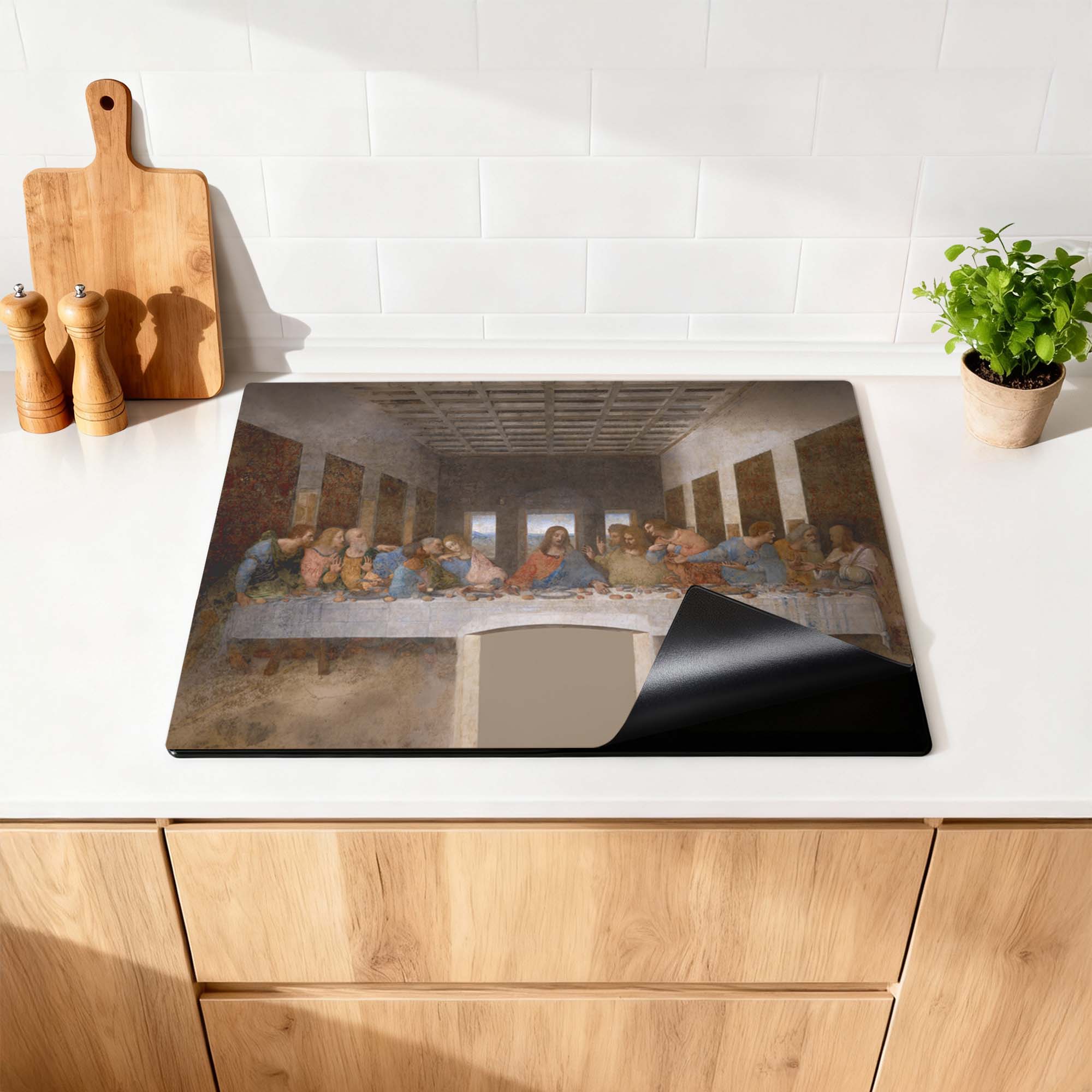 Laatste avondmaal – Inductie Beschermer in keuken met klassiek meesterwerk design voor indrukwekkende uitstraling.