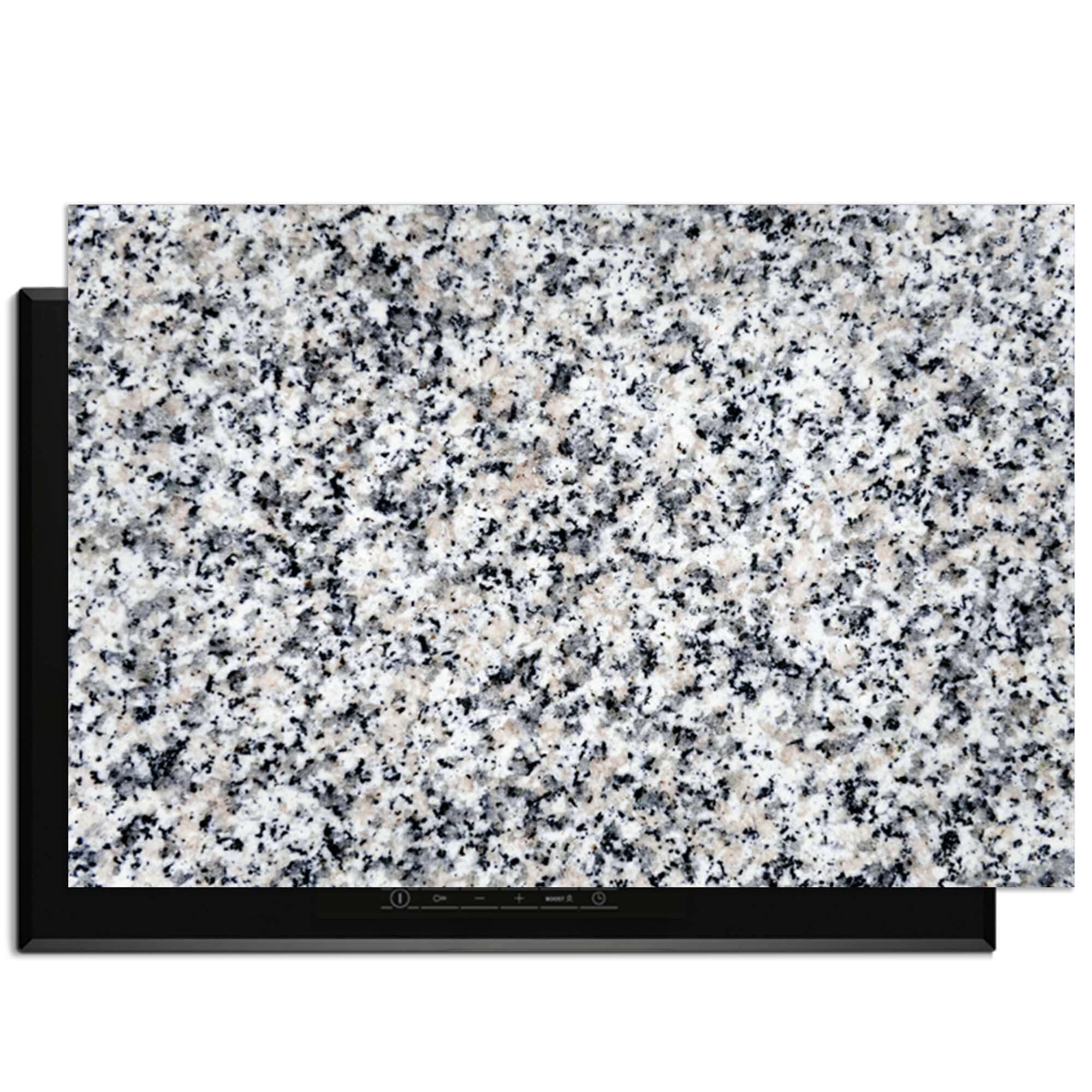 Classic Granite - Induktionsschutz auf einem Induktionskochfeld, mit einer eleganten Granitoberfläche und Schutz.