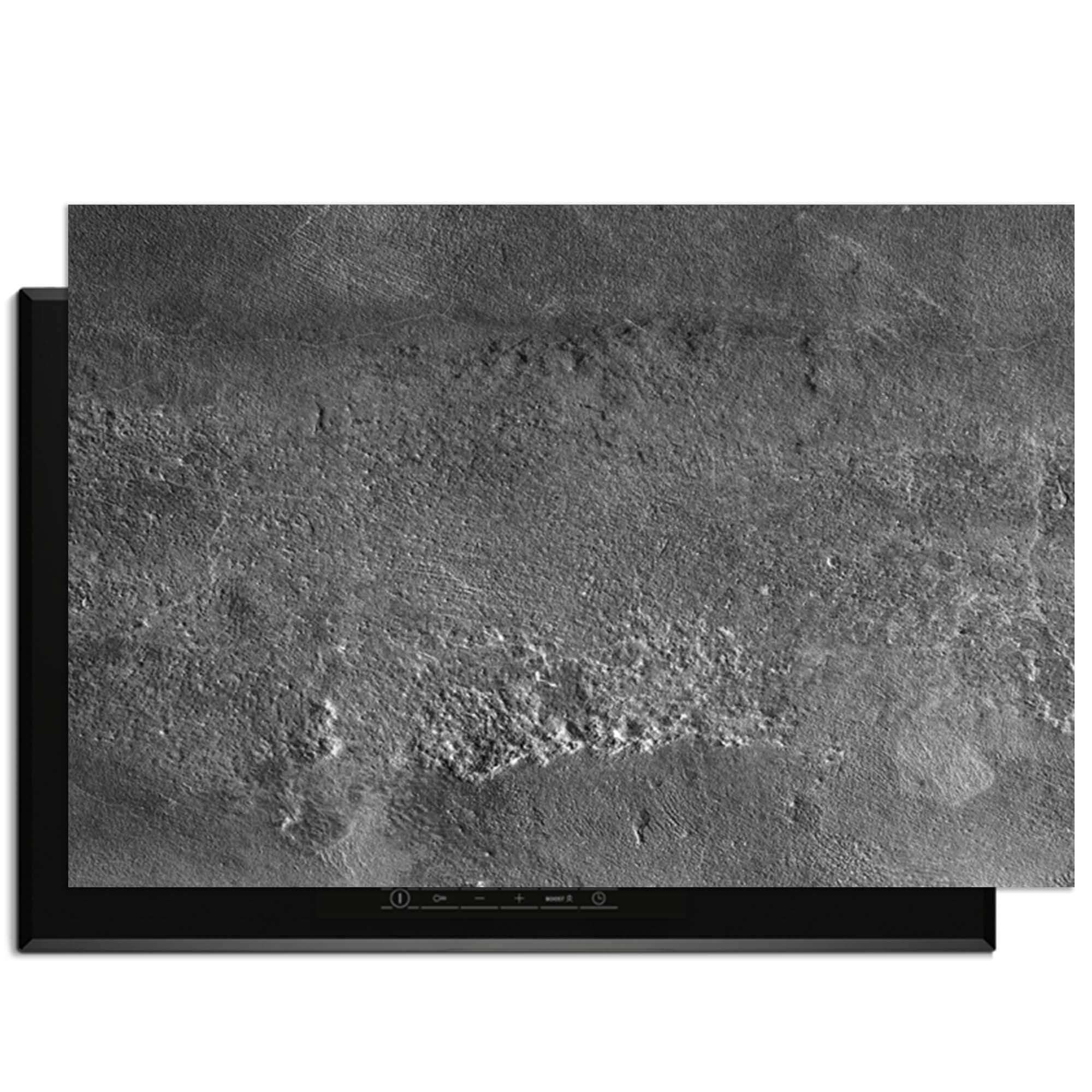 Close-up van de Urban Stone Elegance inductiebeschermer met gedetailleerde granietstructuur