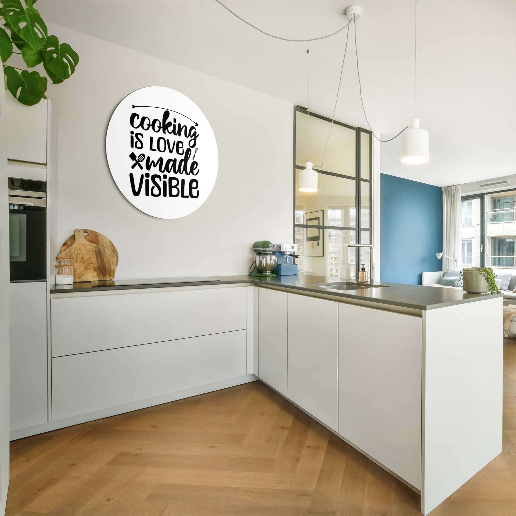 Stijlvolle keuken met "Cooking is love made visible" muurcirkel, perfect voor liefhebbers van koken. Zoekwoorden: Muurcirkel, Muurcirkels, Wandcirkel.