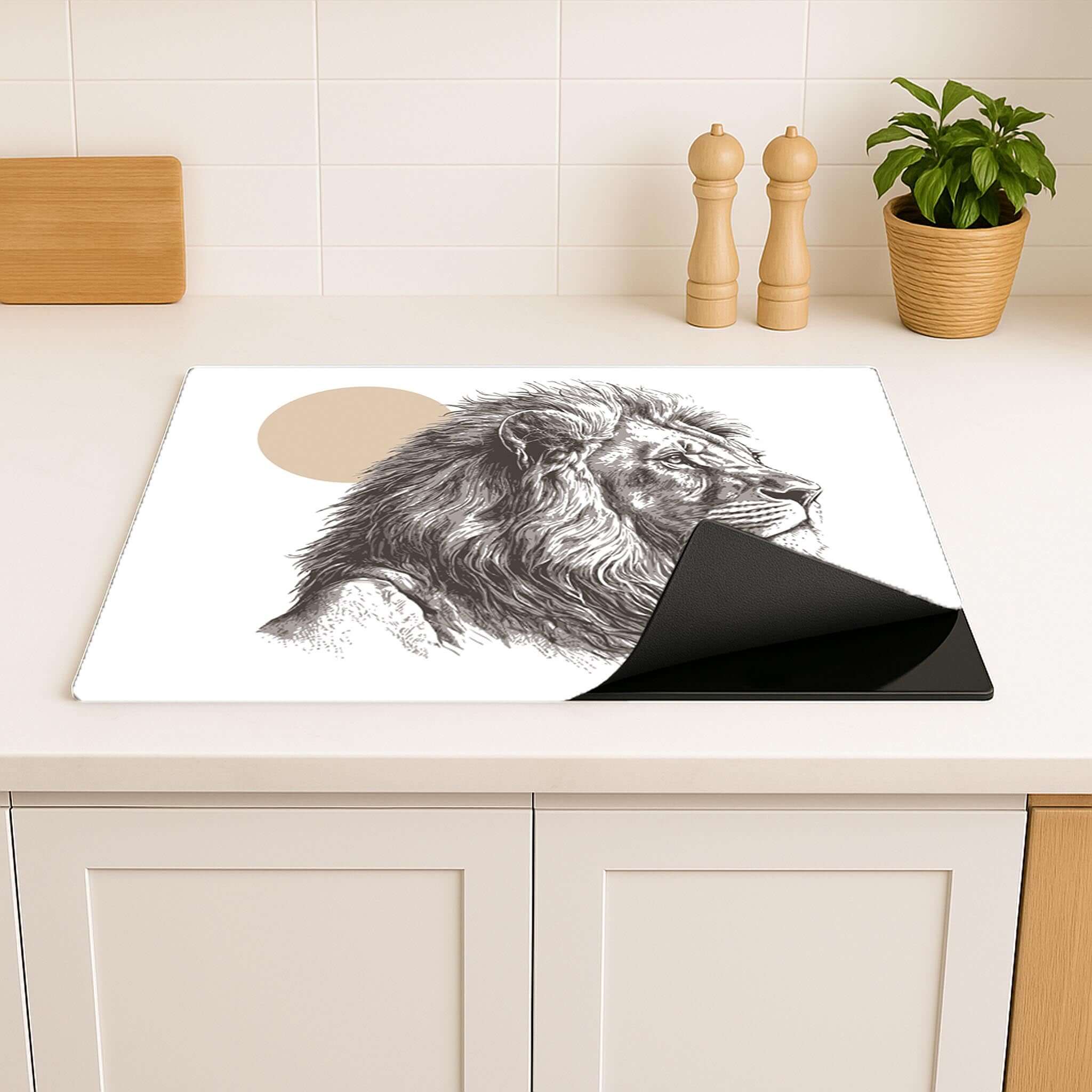 Vinyl inductie beschermer met leeuwenkopdesign op wit aanrechtblad