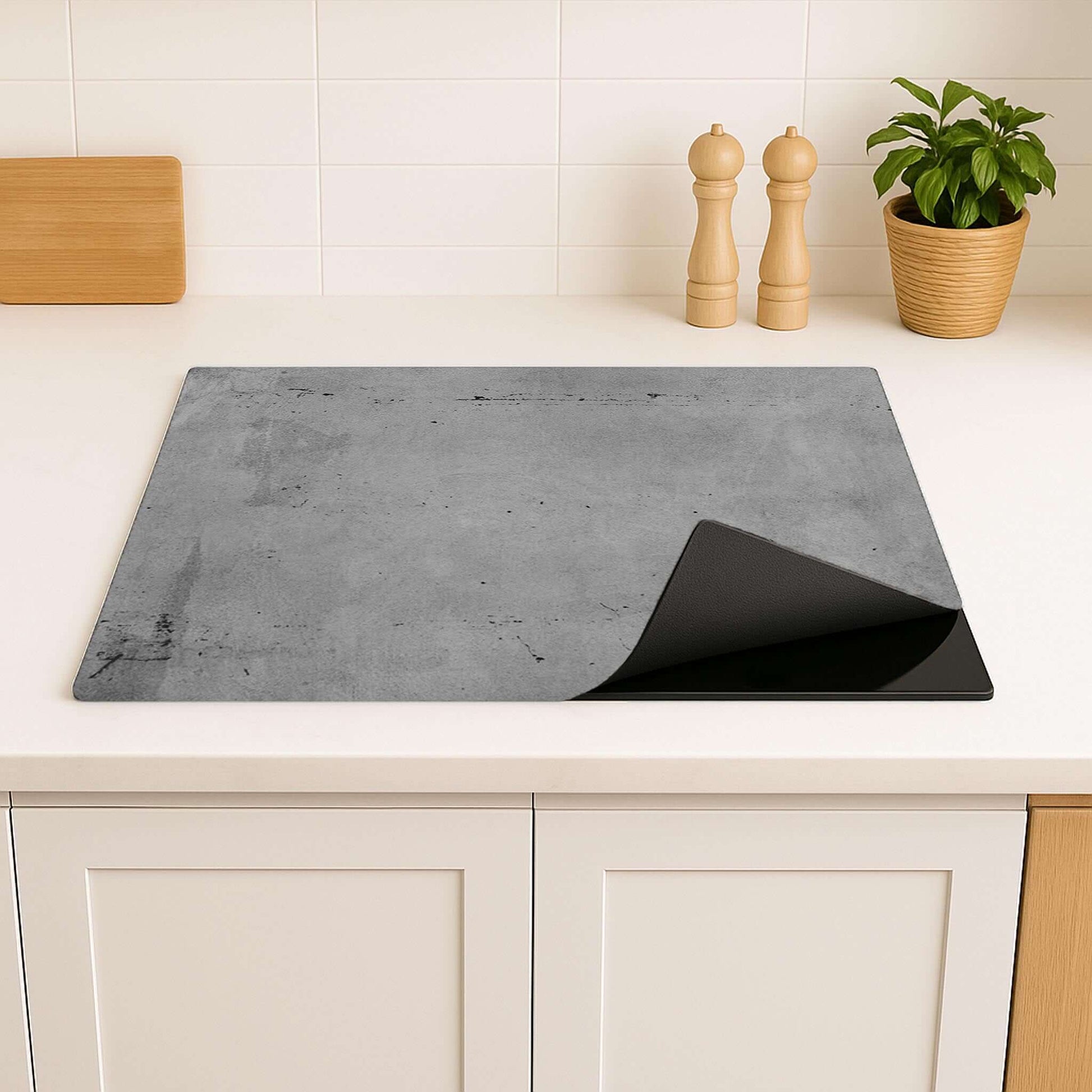 Detail van de Urban Slate inductiebeschermer met oprolbaar duurzaam vinyl.
